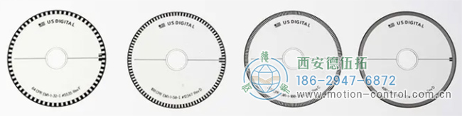 上圖顯示了四個具有不同行數的光電編碼器盤，可以觀察到行的密度不同。